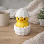 Papercraft poussin dans un œuf en 3D