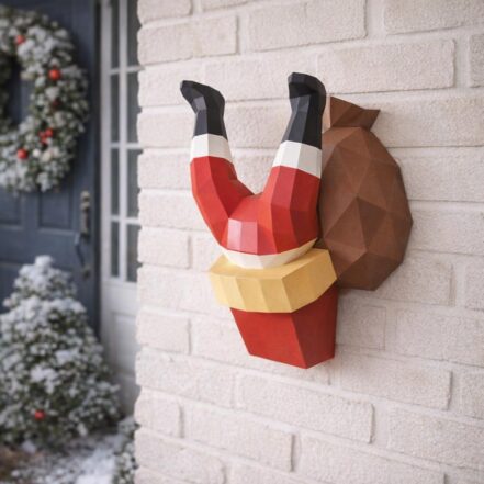Père Noël coincé dans la cheminée